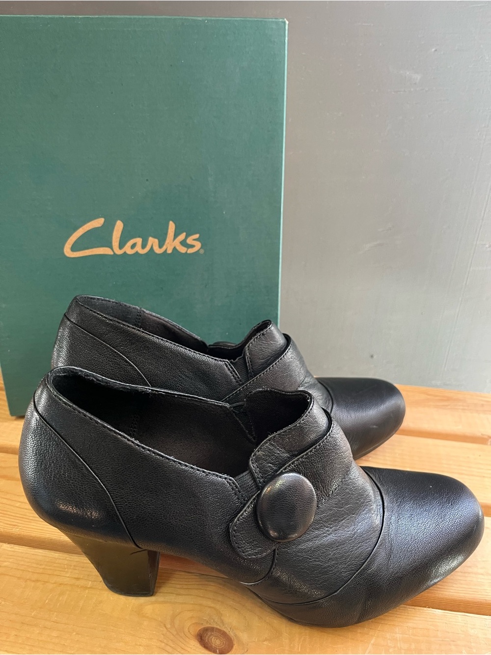 Clarks Black Leather Ankle Booties with Decorative Button